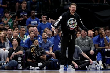 DALLAS, TEXAS - APRIL 16: Luka Doncic #77 of the Dallas Mavericks reacts from the bench as the Dallas Mavericks 