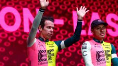 EF Education-EasyPost's Colombian rider Rigoberto Uran (L) waves on stage, flanked by EF Education-EasyPost's Ecuadorian rider Jonathan Caicedo (R) during the opening ceremony and team presentation in Pescara, on May 4, 2023, two days before the departure of the Giro d'Italia 2023 cycling race. - The Giro d'Italia 2023 cycling race's first stage will depart from Fossacesia Marina on May 6, and finish in Rome on May 28. (Photo by Luca Bettini / AFP)