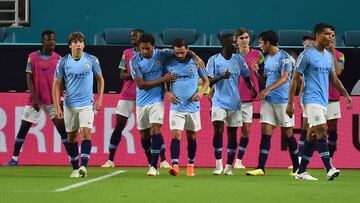 Jul 28, 2018; Miami, FL, USA; Manchester City teammates celebrate the goal of midfielder Bernardo Silva (20) during the second half of an International Champions Cup soccer match against the Bayern Munich at Hard Rock Stadium. Mandatory Credit: Jasen Vinl