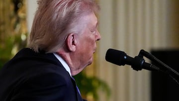 U.S. President Donald Trump speaks, as a patch of blemished skin is visible above his shirt collar, during a Medal of Honor ceremony at the White House in Washington, D.C., U.S., March 2, 2026. REUTERS/Ken Cedeno