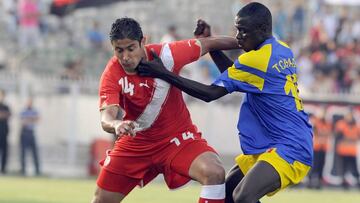 Chad&#039;s Jicard Sam (right) in action against Tunisia