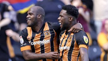 Hull City's Oscar Estupinan celebrates scoring their side's first goal of the game with team-mate Benjamin Tetteh (right) during the Sky Bet Championship match at the MKM Stadium, Hull. Picture date: Saturday August 13, 2022. (Photo by Richard Sellers/PA Images via Getty Images)