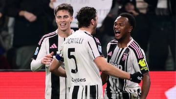 Juventus' Belgian forward #20 Lois Openda (R) celebrates with Juventus' Italian midfielder #05 Manuel Locatelli (C) and Juventus' Turkish forward #10 Kenan Yildiz (L) after scoring Juventus's second goal during the Italian Serie A football match between Juventus and AS Roma at the Allianz stadium in Turin, northern Italy, on December 20, 2025. (Photo by MARCO BERTORELLO / AFP)