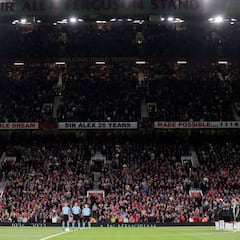 English fans protest the suspension of football after the Queen’s death