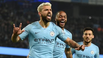 (FILES) In this file photo taken on February 27, 2019 Manchester City's Argentinian striker Sergio Aguero (L) celebrates after scoring the opening goal from the penalty spot during the English Premier League football match between Manchester City and
