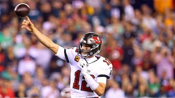 PHILADELPHIA, PENNSYLVANIA - OCTOBER 14: Quarterback Tom Brady #12 of the Tampa Bay Buccaneers throws a second quarter pass against the Philadelphia Eagles at Lincoln Financial Field on October 14, 2021 in Philadelphia, Pennsylvania.   Mitchell Leff/Getty