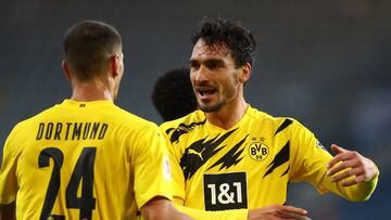 BIELEFELD, GERMANY - OCTOBER 31: Mats Hummels of Borussia Dortmund celebrates with teammate Thomas Meunier after scoring his team's second goal during the Bundesliga match between DSC Arminia Bielefeld and Borussia Dortmund at Schueco Arena on Octobe