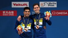 Bronze medallists Spain's Adrian Abadia and Nicolas Garcia Boissier pose during the medal ceremony of the final of the men's 3m springboard synchro diving event during the 2024 World Aquatics Championships at Hamad Aquatics Centre in Doha on February 4, 2024. (Photo by Oli SCARFF / AFP)