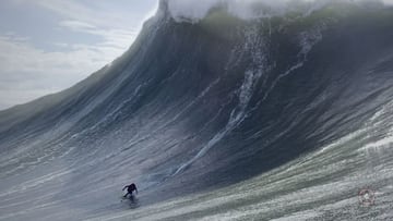 Un surfista surfea una ola gigante en Praia do Norte, Nazar&eacute; (Portugal), el 25 de febrero del 2022. 