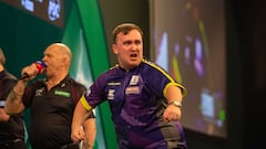 English darts player Luke Littler celebrates a throw during his match against Christian Kist at the 2023 World Darts Championship.