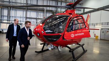 Britain's Prince Williams, Prince of Wales, and David Beckham look at one of the new London Air Ambulance Charity helicopters, during a visit to RAF Northolt, in London, Britain, October 1, 2024. Aaron Chown/Pool via REUTERS