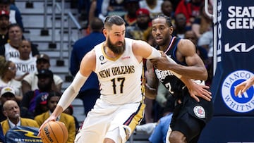 Apr 1, 2023; New Orleans, Louisiana, USA; New Orleans Pelicans center Jonas Valanciunas (17) dribbles against LA Clippers forward Kawhi Leonard (2) during the second half at Smoothie King Center. Mandatory Credit: Stephen Lew-USA TODAY Sports