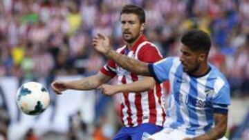 Gabi, luchando un balón con Samuel García.