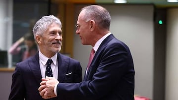 Spain's Interior Minister Fernando Grande-Marlaska (L) speaks with Austrian Interior Minister Gerhard Karner (R) before a Justice and Home Affairs meeting on the enlargement of Schengen area and Western Balkan migration route at the EU headquarters in Brussel on December 8, 2022. (Photo by Kenzo TRIBOUILLARD / AFP) (Photo by KENZO TRIBOUILLARD/AFP via Getty Images)