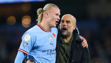 MANCHESTER, ENGLAND - NOVEMBER 05: Josep 'Pep' Guardiola, manager of Manchester City, celebrates with Erling Haaland of Manchester City following the Premier League match between Manchester City and Fulham FC at Etihad Stadium on November 05, 2022 in Manchester, England. (Photo by James Gill - Danehouse/Getty Images)