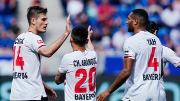 07 May 2022, Baden-Wuerttemberg, Sinsheim: Soccer: Bundesliga, TSG 1899 Hoffenheim - Bayer Leverkusen, Matchday 33, PreZero Arena. Leverkusen's goal scorer Patrik Schick (l) celebrates with teammates after scoring the goal to make it 1-1. Photo: Uwe Anspach/dpa - IMPORTANT NOTE: In accordance with the requirements of the DFL Deutsche Fußball Liga and the DFB Deutscher Fußball-Bund, it is prohibited to use or have used photographs taken in the stadium and/or of the match in the form of sequence pictures and/or video-like photo series. (Photo by Uwe Anspach/picture alliance via Getty Images)