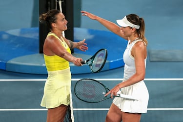 Belarus' Aryna Sabalenka (L) greets Spain's Paula Badosa after winning their women's singles semi-final match on day twelve of the Australian Open tennis tournament in Melbourne on January 23, 2025. (Photo by Adrian Dennis / AFP) / -- IMAGE RESTRICTED TO EDITORIAL USE - STRICTLY NO COMMERCIAL USE --