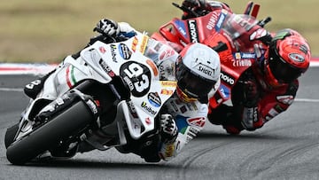 Gresini Racing MotoGP's Spanish rider Marc Marquez leads ahead of Ducati Lenovo Team's Italian rider Francesco Bagnaia during the San Marino MotoGP race at the Misano World Circuit Marco-Simoncelli in Misano Adriatico on September 8, 2024. (Photo by Gabriel BOUYS / AFP)