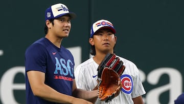 ARLINGTON, TEXAS - JULY 15: Shohei Ohtani #17 of the Los Angeles Dodgers speaks with Shota Imanaga #18 of the Chicago Cubs during Gatorade All-Star Workout Day at Globe Life Field on July 15, 2024 in Arlington, Texas. Richard Rodriguez/Getty Images/AFP (Photo by Richard Rodriguez / GETTY IMAGES NORTH AMERICA / Getty Images via AFP)