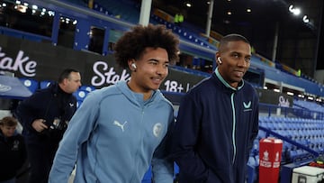 LIVERPOOL, ENGLAND - JANUARY 9: Ashley Young of Everton and Tyler Young of Peterborough United walk out to the pitch prior to the Emirates FA Cup Third Round match between Everton and Peterborough United at Goodison Park on January 9, 2025 in Liverpool, England. (Photo by Molly Darlington - AMA/Getty Images)