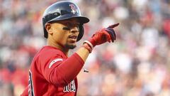 BOSTON, MA - JULY 26: Mookie Betts #50 of the Boston Red Sox reacts as he crosses home plate after hitting a solo home run in the first inning of a game against the New York Yankees at Fenway Park on July 26, 2019 in Boston, Massachusetts.   Adam Glanzman