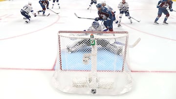 DENVER, COLORADO - JUNE 15: Andre Burakovsky #95 of the Colorado Avalanche scores a goal against Andrei Vasilevskiy #88 of the Tampa Bay Lightning during overtime to win Game One of the 2022 Stanley Cup Final 4-3 at Ball Arena on June 15, 2022 in Denver, Colorado.   Justin Edmonds/Getty Images/AFP
== FOR NEWSPAPERS, INTERNET, TELCOS & TELEVISION USE ONLY ==