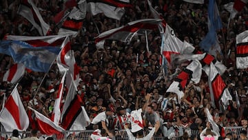 River Plate's midfielder Enzo Perez (C) celebrates after his teammate Colombian forward Miguel Borja (L) scored a penalty kick against Boca Juniors during their Argentine Professional Football League Tournament 2023 match at El Monumental stadium in Buenos Aires on May 7, 2023. (Photo by Luis ROBAYO / AFP)