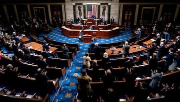 FILE PHOTO: Republican and Democrats clap while House Minority Leader Kevin McCarthy (R-CA) commends Capitol Police and law enforcement for their work after rioters supporting President Donald Trump breached the U.S. Capitol, as the House of Representativ