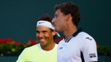 SONRISA. Rafa Nadal en el dobles junto a Pablo Carreño.