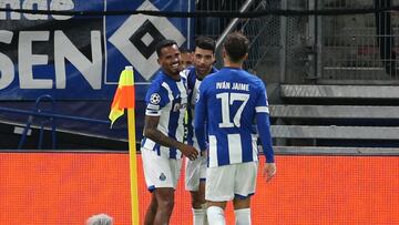 Soccer Football - Champions League - Group H - Shakhtar Donetsk v FC Porto - Volksparkstadion, Hamburg, Germany - September 19, 2023  FC Porto's Mehdi Taremi celebrates scoring their third with teammates Galeno and Ivan Jaime REUTERS/Cathrin Mueller