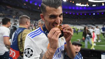 PARIS, FRANCE - MAY 28: Dani Ceballos of Real Madrid celebrates with his winners medal following his team's victory in the UEFA Champions League final match between Liverpool FC and Real Madrid at Stade de France on May 28, 2022 in Paris, France. (Photo by Harriet Lander/Copa/Getty Images)