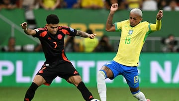 Colombia's forward #07 Luis Diaz and Brazil's defender #13 Wesley fight for the ball during the 2026 FIFA World Cup South American qualifiers football match between Brazil and Colombia, at the Mane Garrincha stadium in Brasilia, on March 20, 2025. (Photo by EVARISTO SA / AFP)