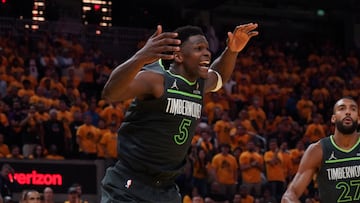 May 10, 2025; San Francisco, California, USA; Minnesota Timberwolves guard Anthony Edwards (5) celebrates after dunking over Golden State Warriors forward Trayce Jackson-Davis (32) in the fourth quarter during game three in the second round for the 2025 NBA Playoffs at Chase Center. Mandatory Credit: David Gonzales-Imagn Images