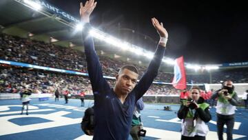PARIS, FRANCE - DECEMBER 28: Kylian Mbappe #7 of Paris Saint-Germain celebrates the victory with fans during the Ligue 1 match between Paris Saint-Germain and RC Strasbourg at Parc des Princes on December 28, 2022 in Paris, France. (Photo by Xavier Laine/Getty Images)