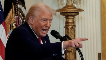 U.S. President Donald Trump arrives to host a reception honouring Black History Month in the East Room of the White House in Washington, D.C., U.S., February 20, 2025. REUTERS/Kent Nishimura