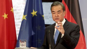 Chinese Foreign Minister Wang Yi speaks during a press conference in Berlin. Yi has called for restraint in the war in Ukraine