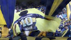 Fans of Boca Juniors display a banner depicting ex-footballer and current vice-president of the club, Juan Roman Riquelme, before the Argentine Professional Football League tournament match against River Plate at La Bombonera stadium in Buenos Aires, on September 11, 2022. (Photo by Alejandro PAGNI / AFP) (Photo by ALEJANDRO PAGNI/AFP via Getty Images)