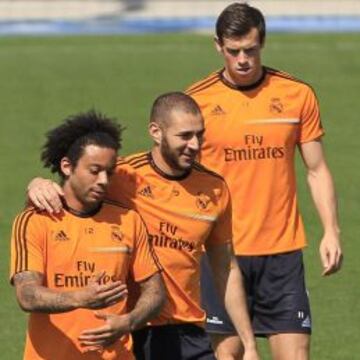 ÚLTIMO ESFUERZO. Marcelo y Benzema, en un momento del entrenamiento de ayer.