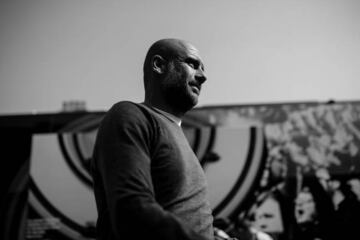 Cooler in black and white | Manchester City manager Josep Guardiola looks on before the Premier League match against Fulham FC.