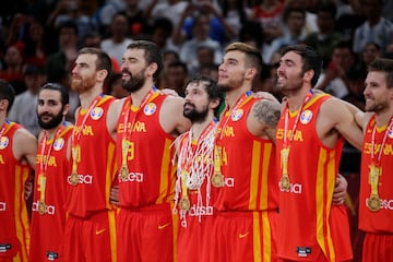 The Spain side receive their winners' medals.