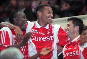 May 1997: Victor Ikpeba, Thierry Henry and John Collins celebrate after clinching the Ligue 1 title with Monaco.