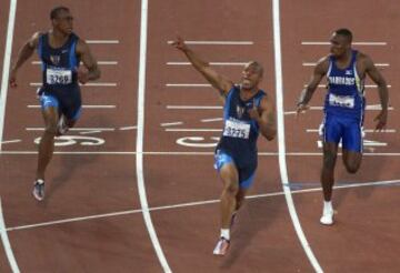 Atleta estadounidense ganador de la medalla de oro en los 100 metros lisos durante los Juegos Olímpicos de Sydney 2000. Su mejor registro personal 9,79 lo logró el 16 de junio de 1999 en el Gran Premio II IAAF en Atenas.