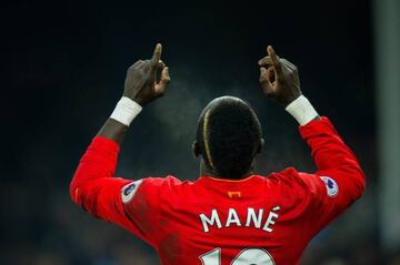 Sadio Mane turns to the sky to celebrate Liverpool's late winner.