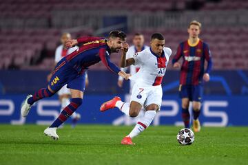 Gerard Piqué y Kylian Mbappé.