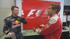 Kvyat y Vettel discutiendo antes de la ceremonia del podio.
