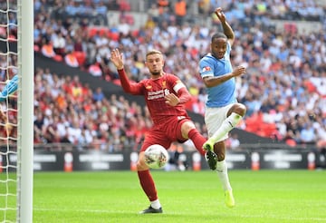 Raheem Sterling fires Man City ahead. Min.13