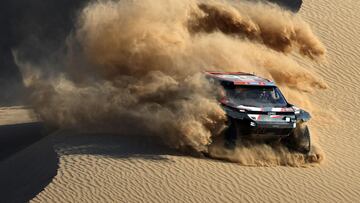 Qatari driver Nasser Al-Attiyah steers his car assisted by his co-driver Edouard Boulanger during stage 2B of the 47th Dakar Rally between Bisha and Bisha, on January 6, 2025. (Photo by Valery HACHE / AFP)