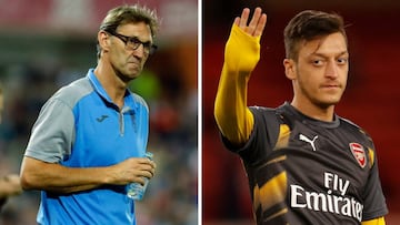 Tony Adams y Mesut &Ouml;zil.