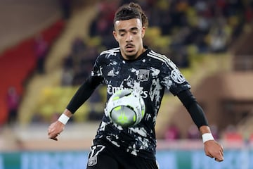 Lyon's French defender Malo Gusto controls the ball during the French L1 football match between AS Monaco and Lyon at the "Louis II" stadium in Monaco, on February 5, 2022. (Photo by Valery HACHE / AFP)