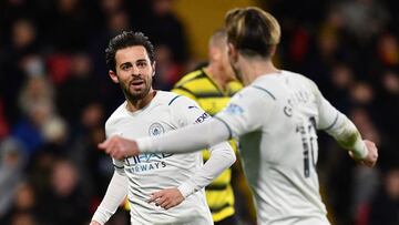 Manchester City&#039;s Portuguese midfielder Bernardo Silva celebrates scoring his team&#039;s third goal during the English Premier League football match between Watford and Manchester City at Vicarage Road Stadium in Watford on December 4, 2021. (Photo 